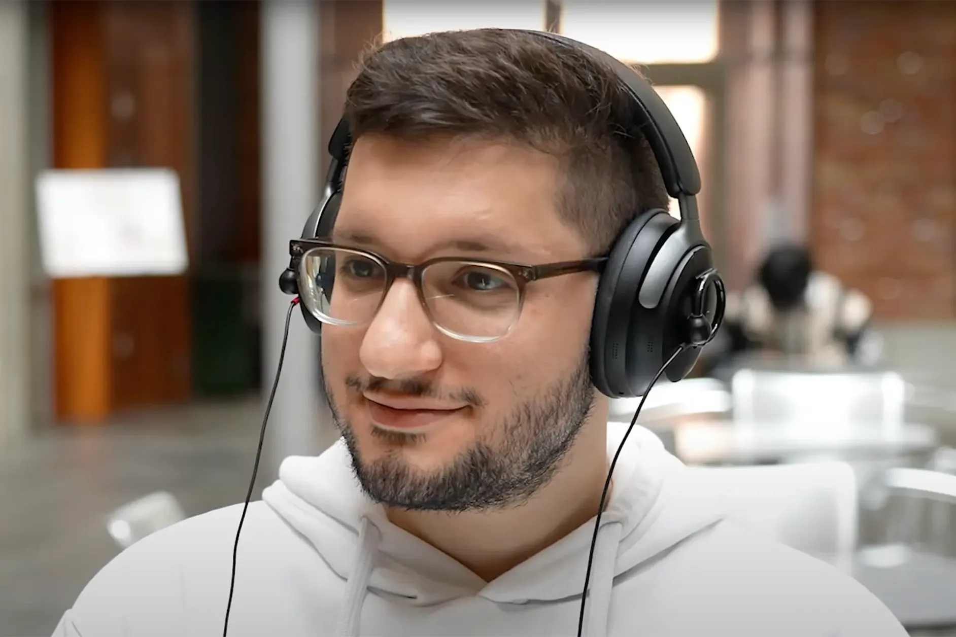 man testing AI Headphones