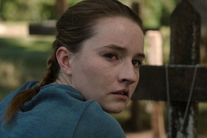 Kaitlyn Dever near a grave in The Last of Us season 2.