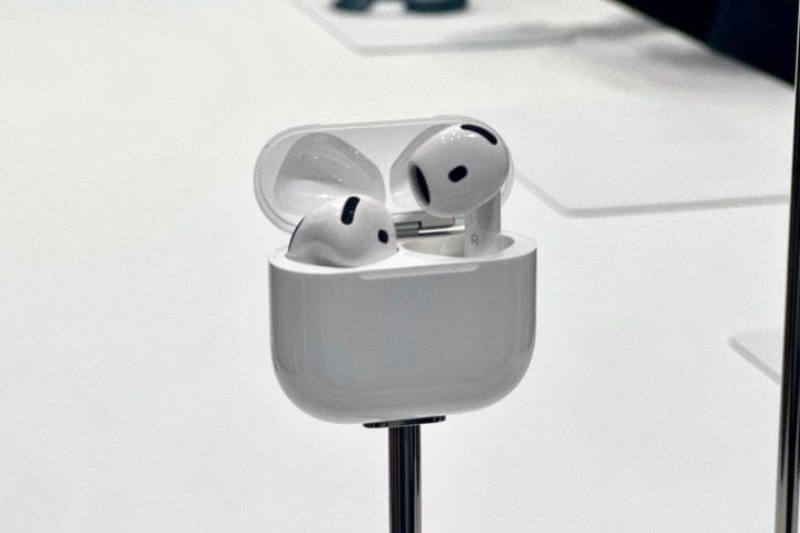 Apple AirPods 4 in charging case.