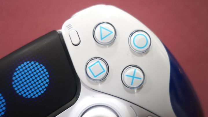 Close-up of the face buttons on the Astro Bot controller.