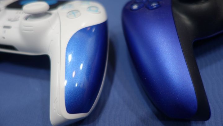 Comparative color of Astro Bot DualSense controller against another blue PS5 controller.