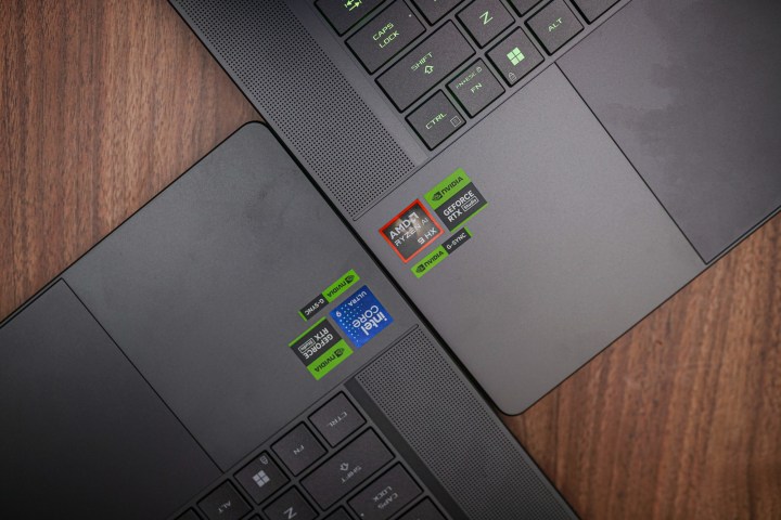 AMD and Intel logos next to each other on gaming laptops.