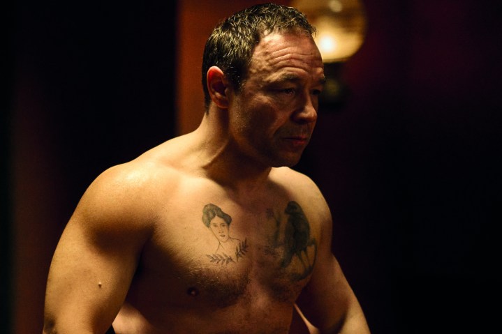 Stephen Graham walks shirtless in A Thousand Blows.