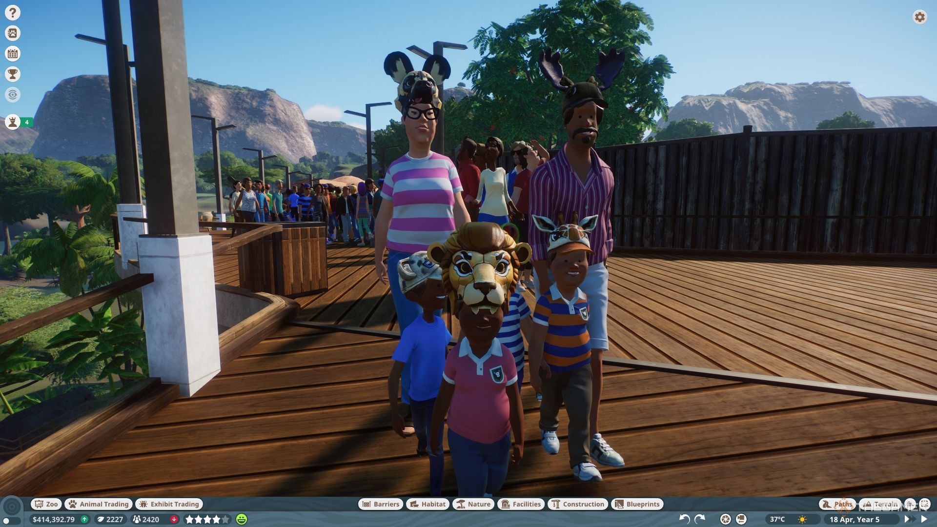 A family of guests each wearing animal-themed hats.