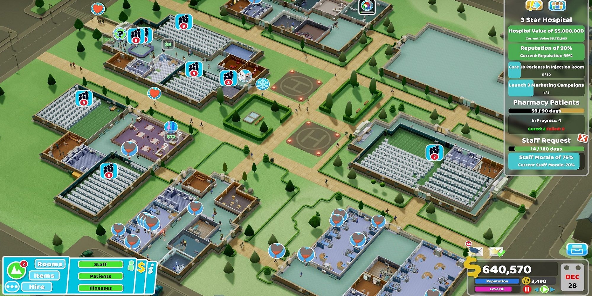 Two Point Hospital screenshot overview of multiple buildings.