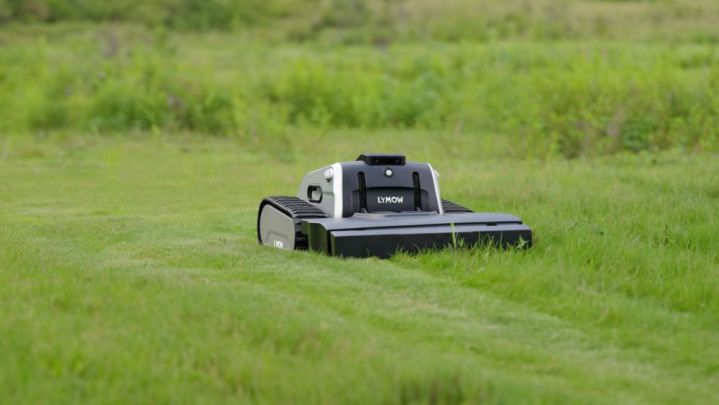 The Lymow One working in an overgrown yard.