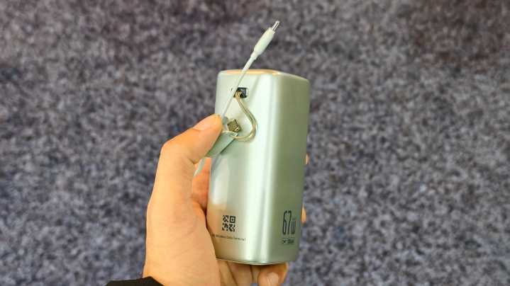 A person holding the Baseus EnerGeek Power Bank.