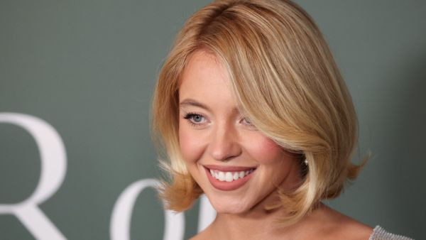Sydney Sweeney Sparks Heat with Male Model for Syrn